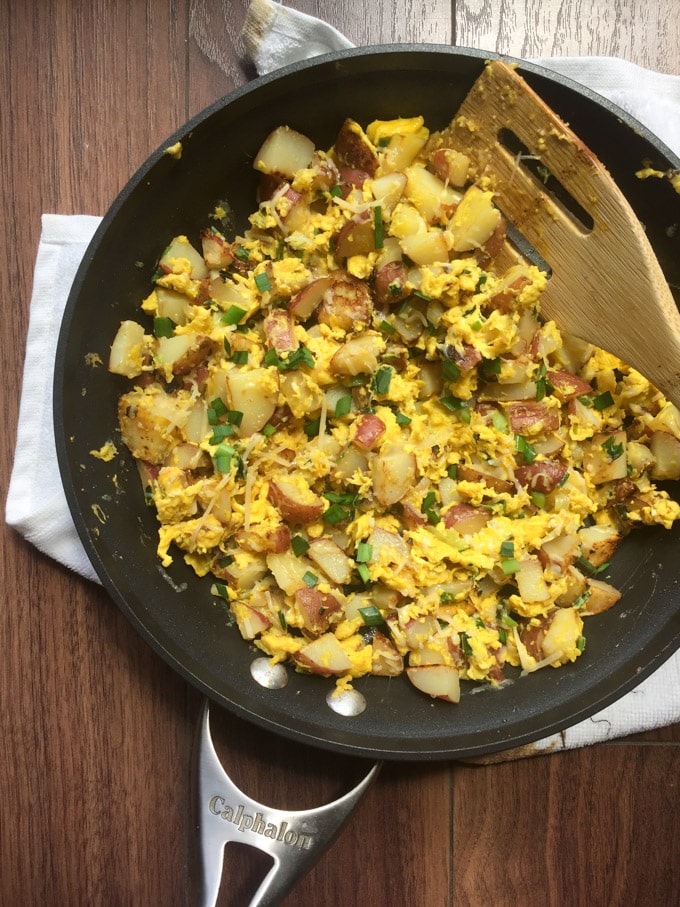 Potato and egg scramble in a pan