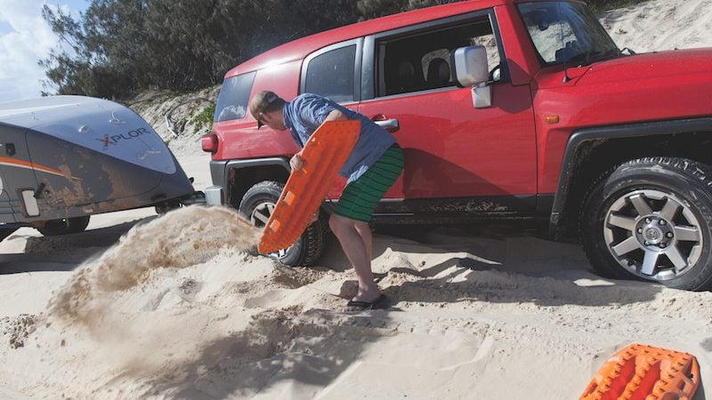 A set of Maxtrax being used to recover an FJ LandCruiser