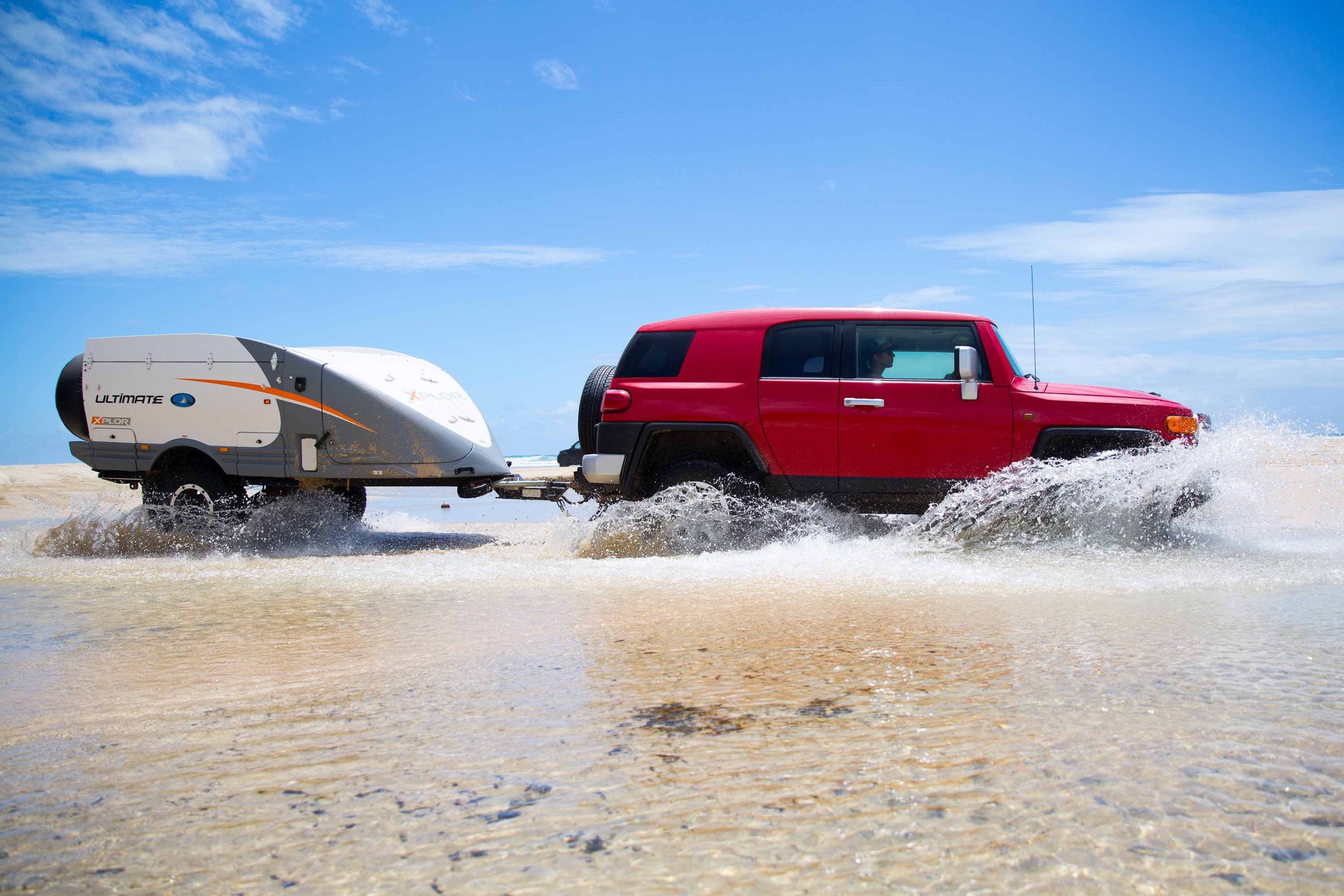 Car driving through water