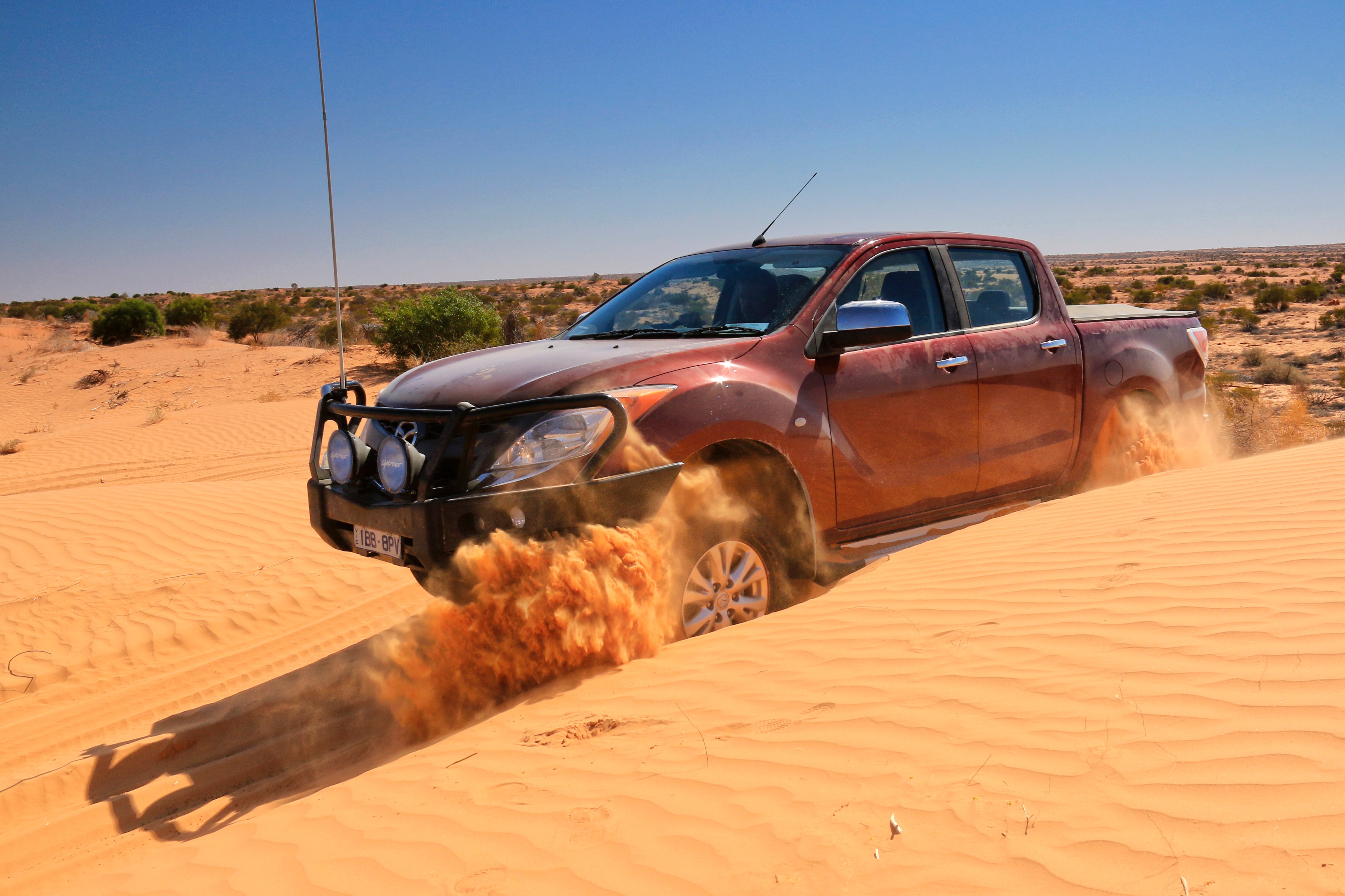 Car driving on sand