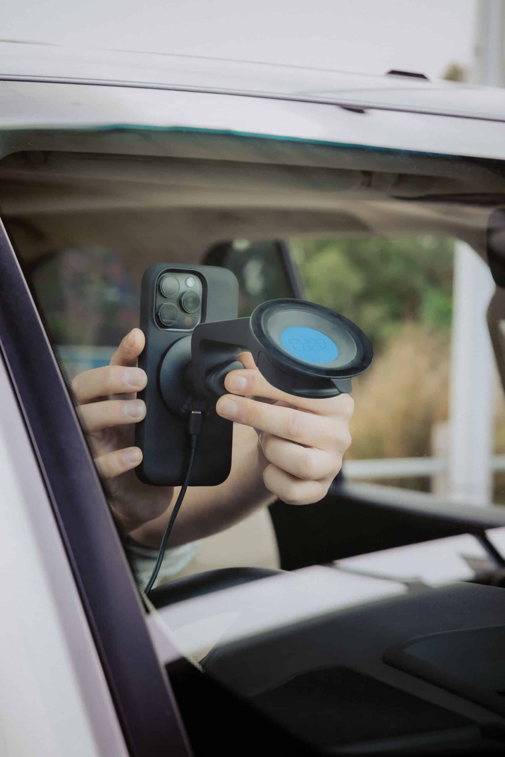 Quad Lock Suction Windscreen Dash Mount installed in Land Cruiser 300 Series with phone mounted