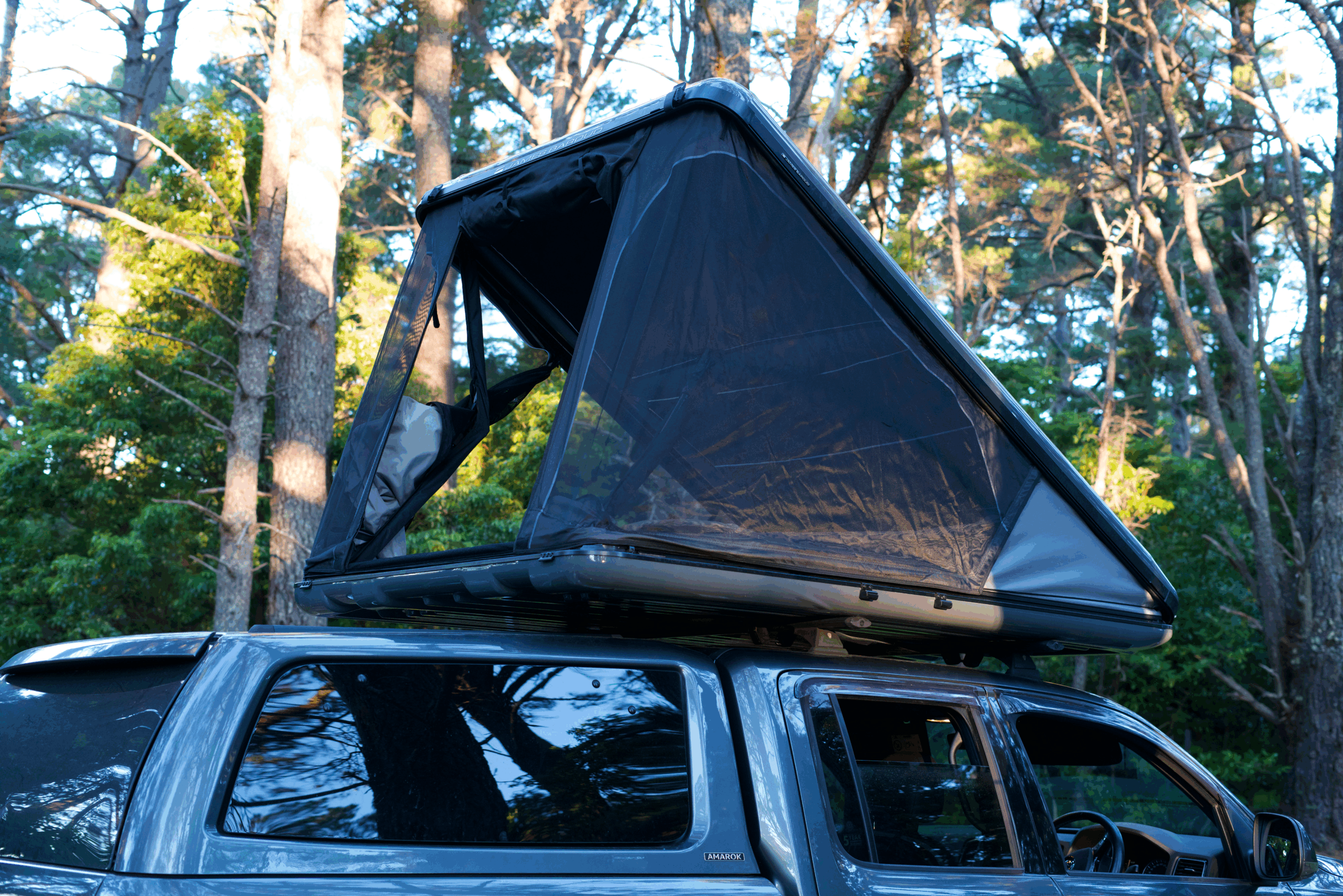 Clamshell tent in closed position on 4WD roof