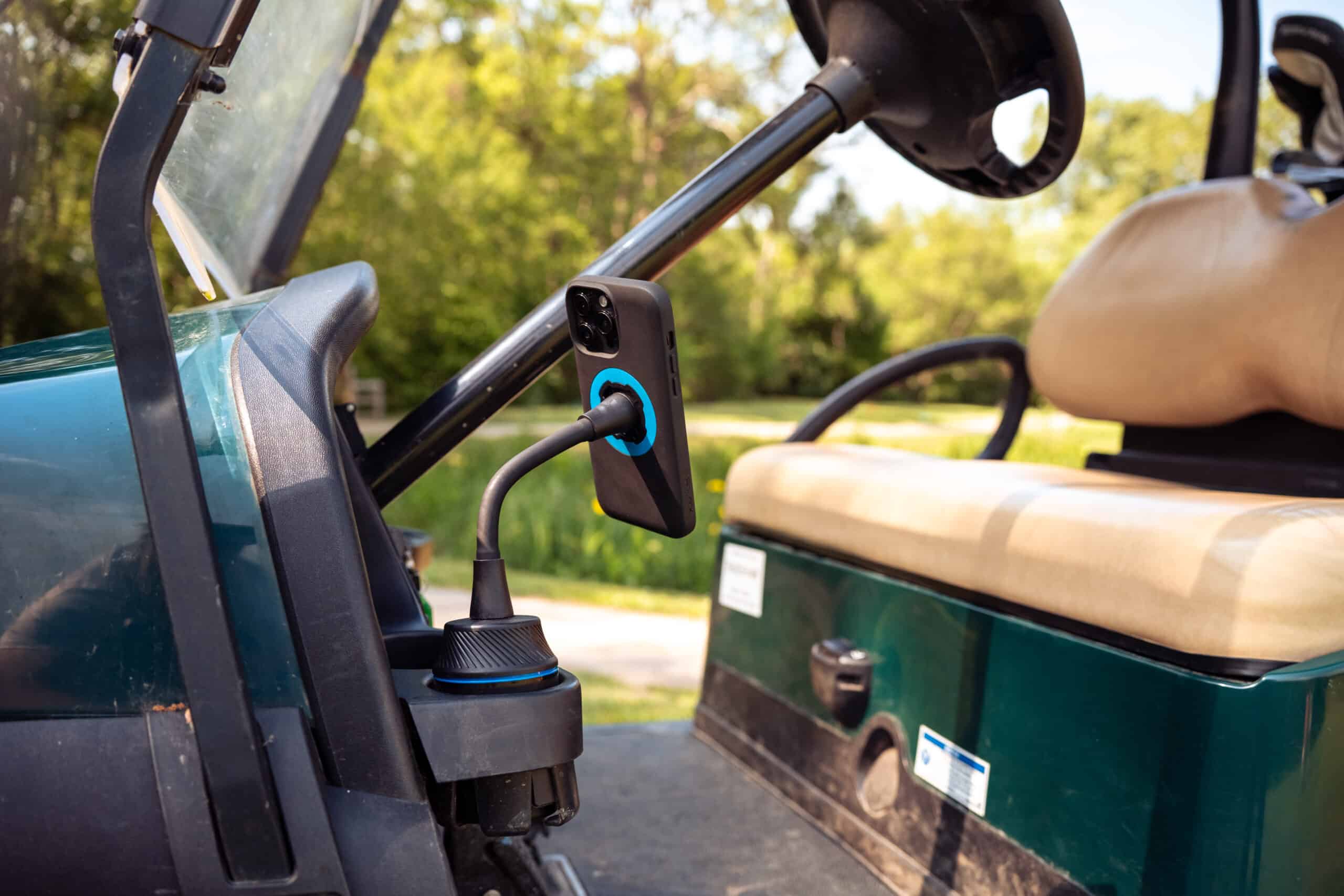 Quad Lock Cup Holder Mount with adjustable gooseneck arm and phone mounted in vehicle cup holder