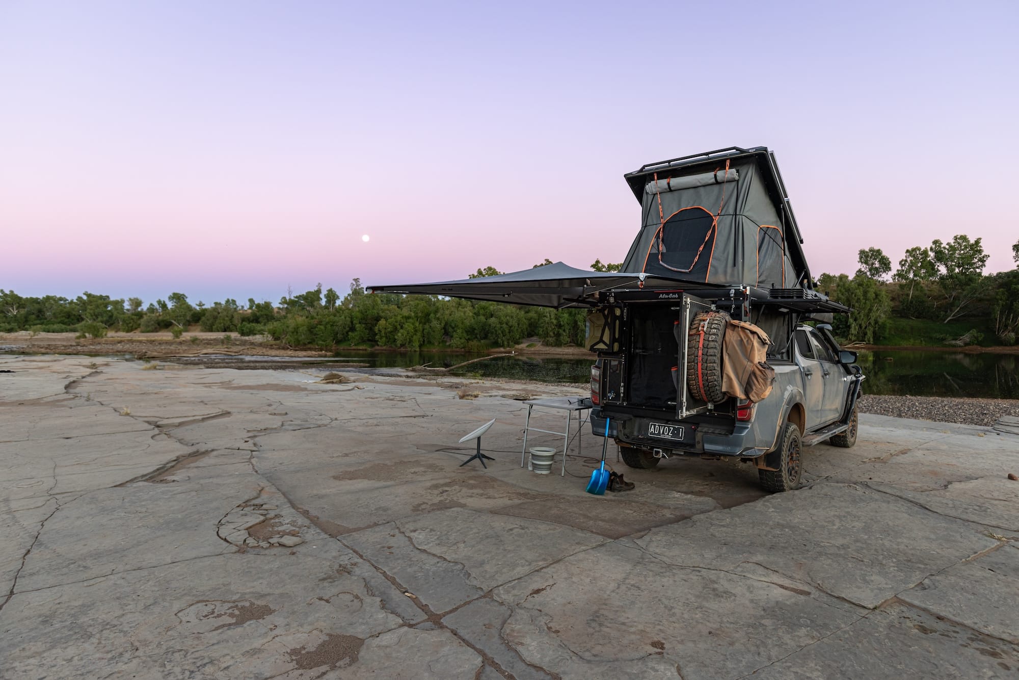 4WD with rooftop tent parked at sunset on Ord River Duncan Road Kimberley