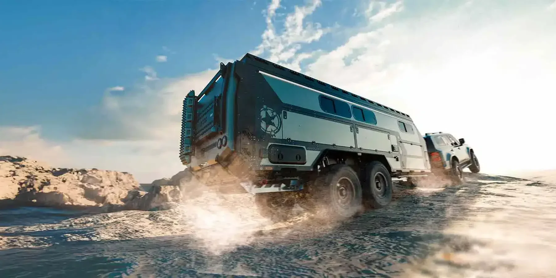 Patriot Campers ST7 Supertourer being towed off-road