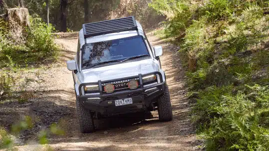 ARB BASE Rack roof rack system on Toyota Prado showing low profile mounting