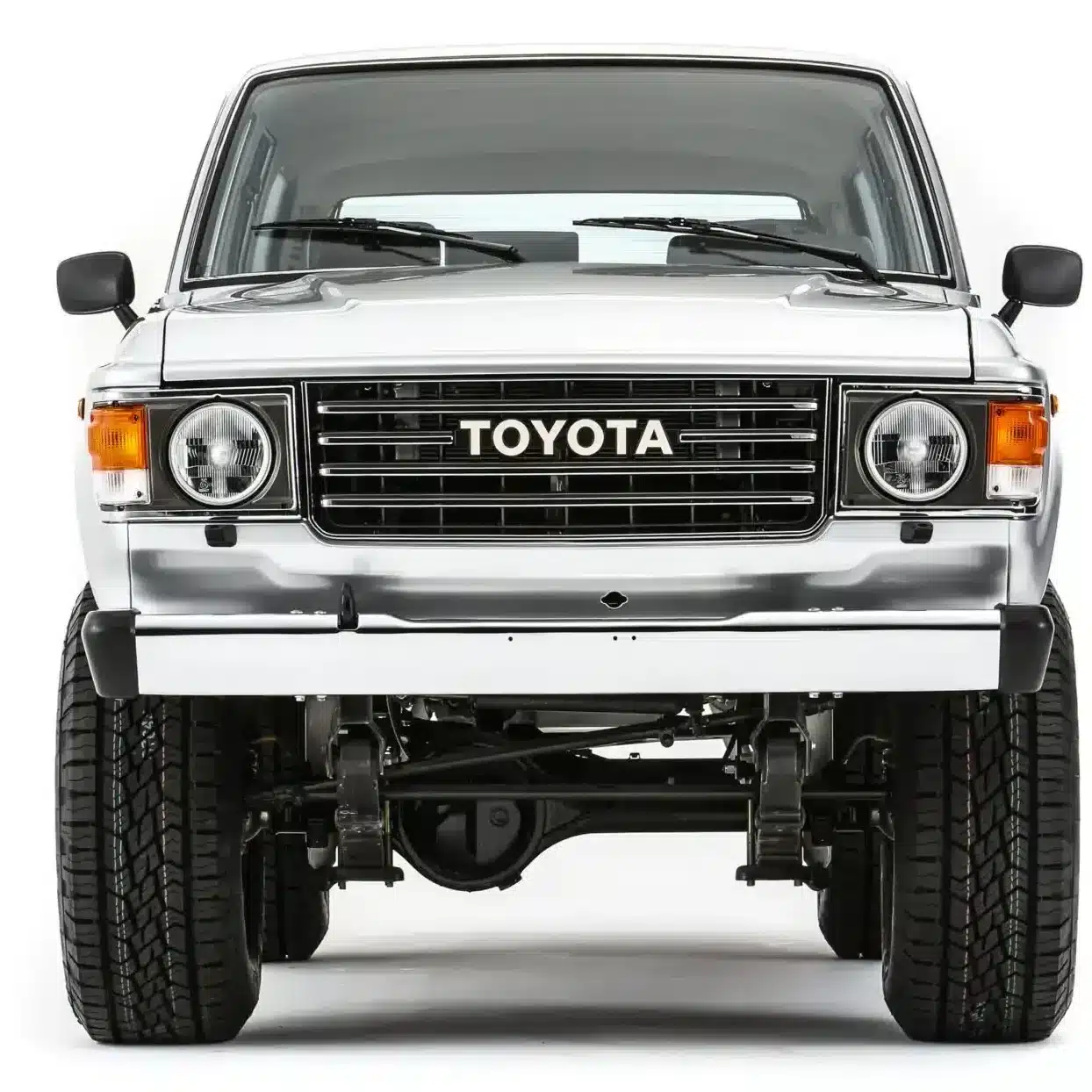 Toyota FJ60 Land Cruiser Turbo Trail Cruiser at SEMA 2025 showing factory-original silver paint and period-correct graphics