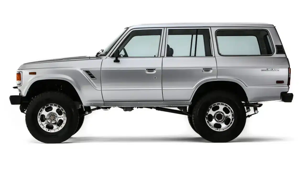 FJ60 wagon side profile showing factory-original body lines and period-correct styling