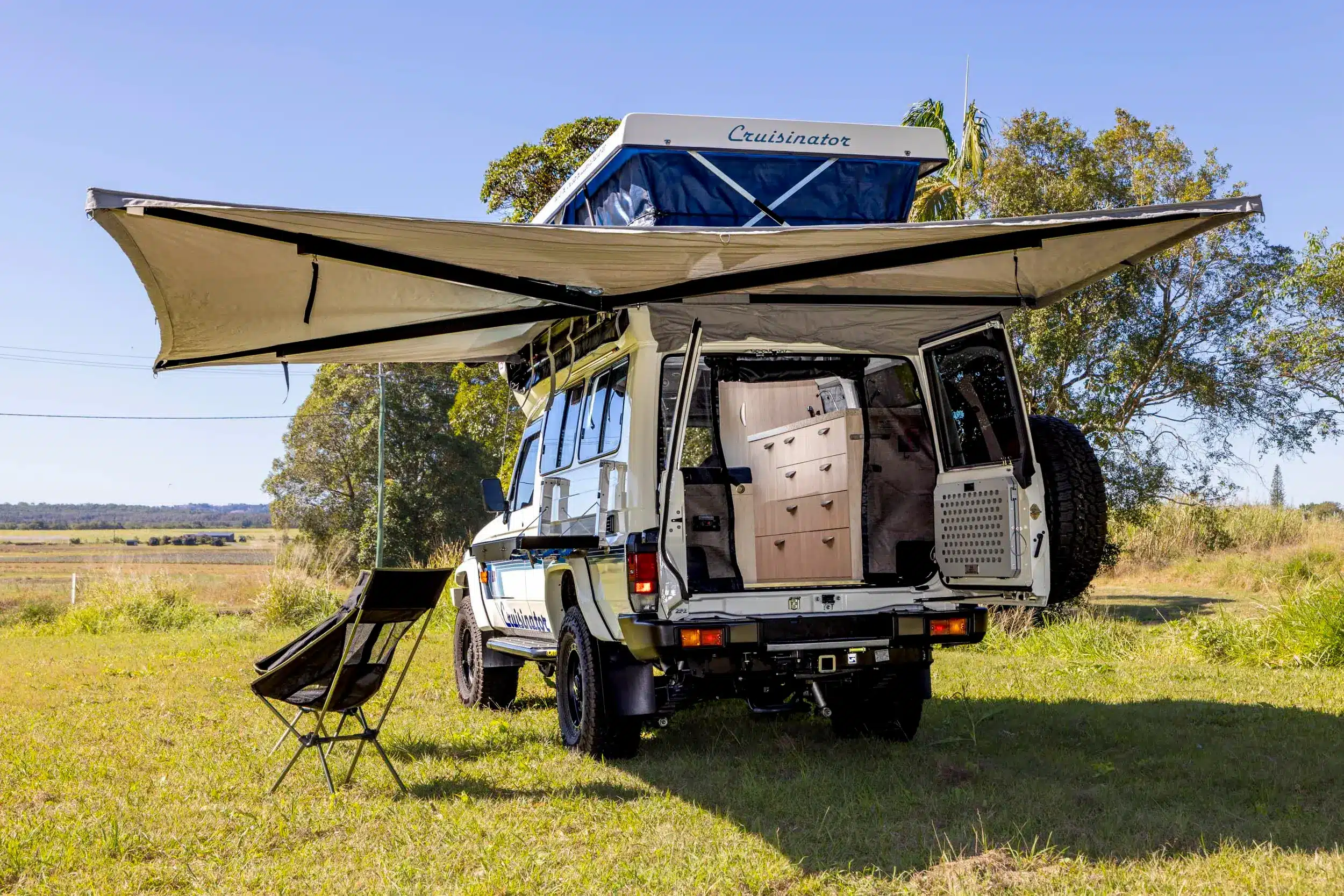 Bonetti Campers Cruisinator review: Pop-top deployed showing canvas windows