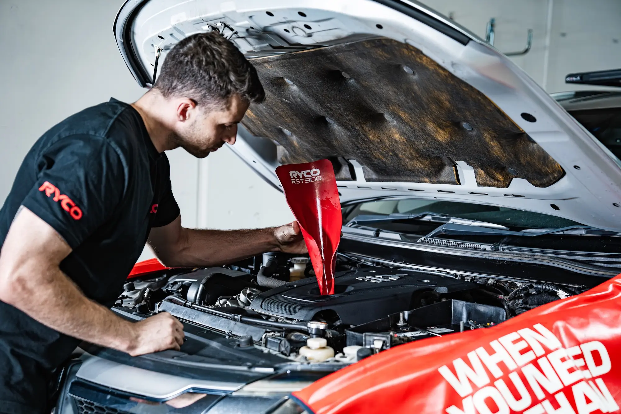 Workshop mechanic using Ryco tools