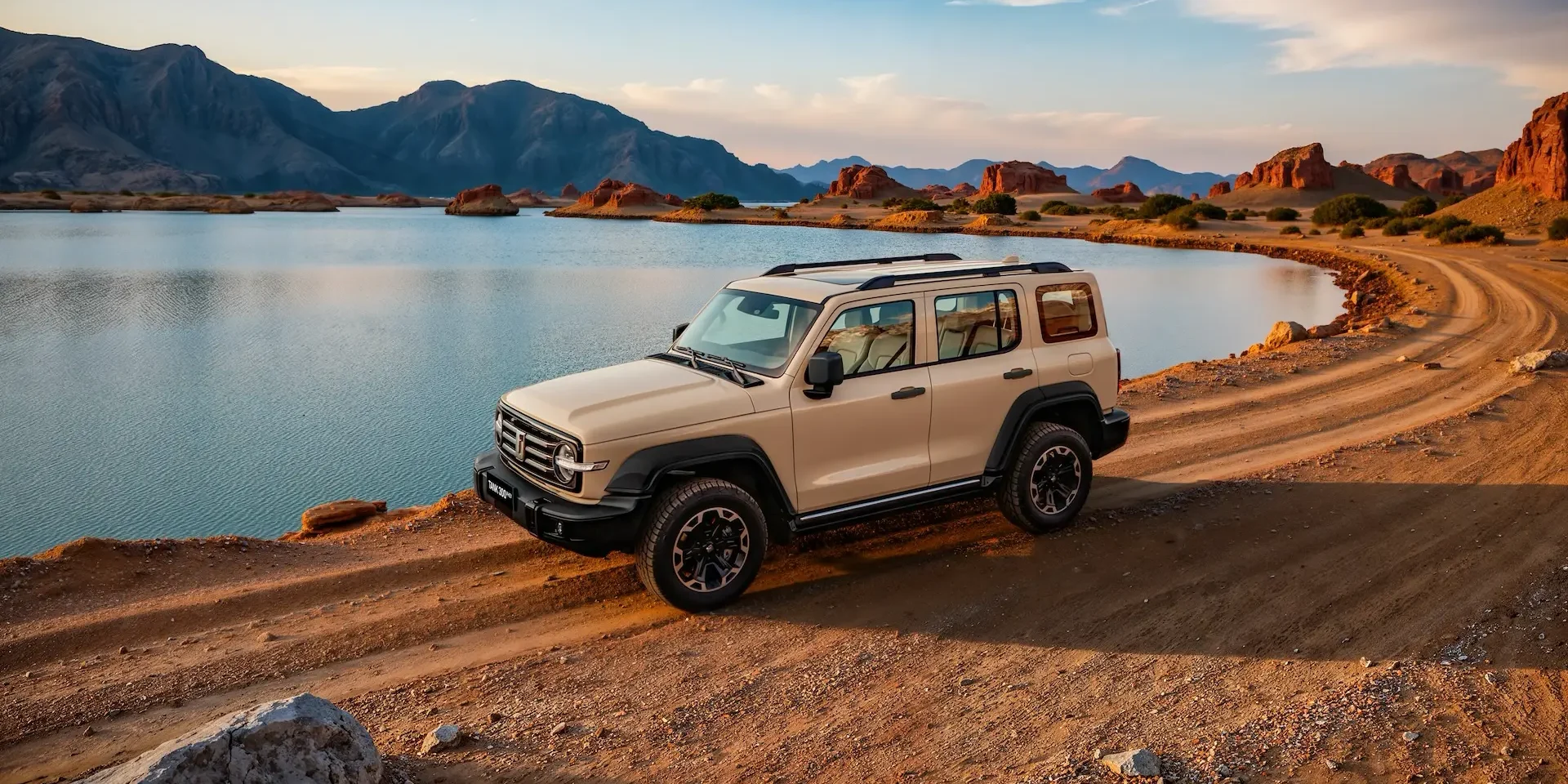 Tank 300 PHEV Lake: Silver Tank 300 parked by a lake on a dirt road