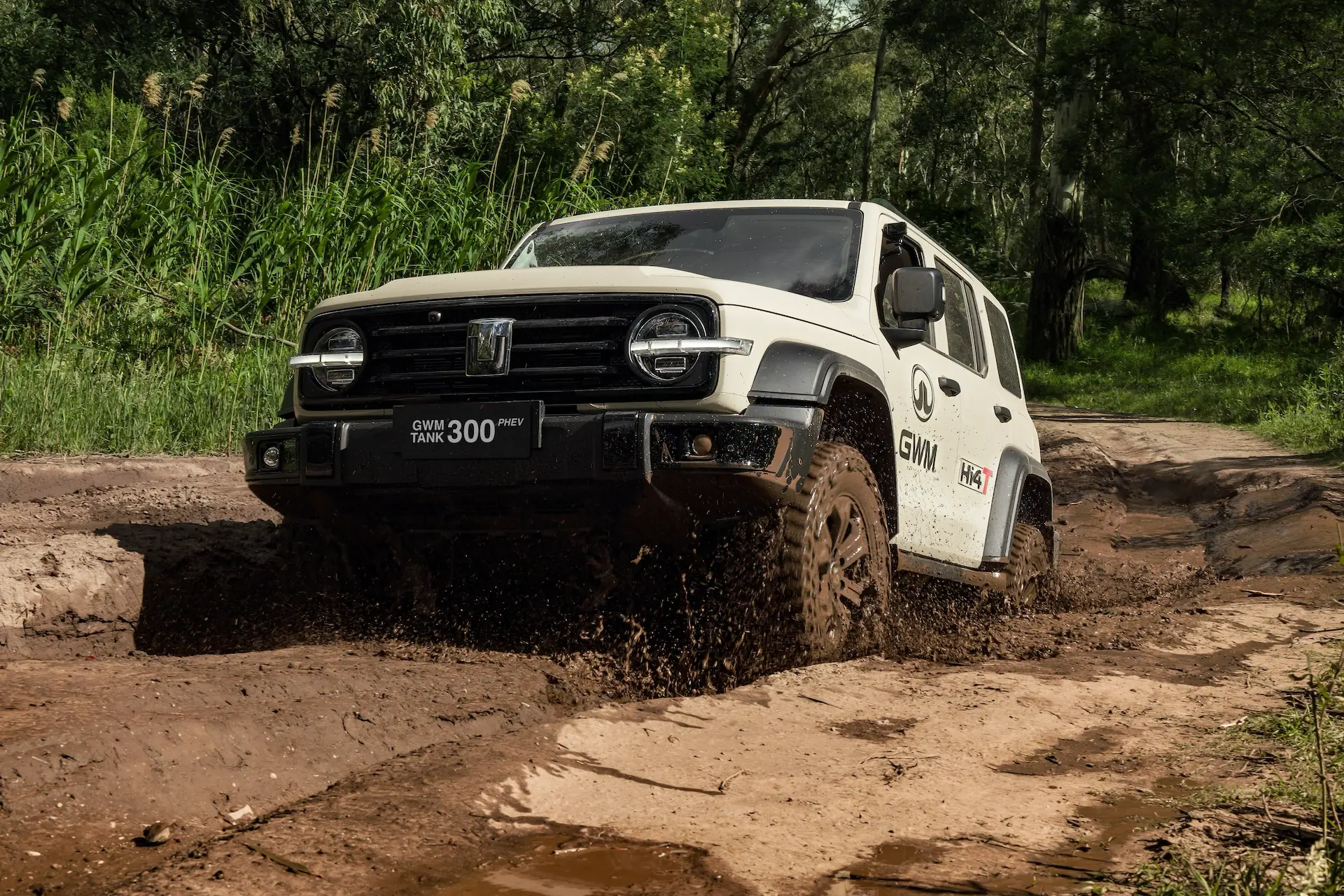 GWM Tank 300 Hi4-T exiting a muddy bog hole