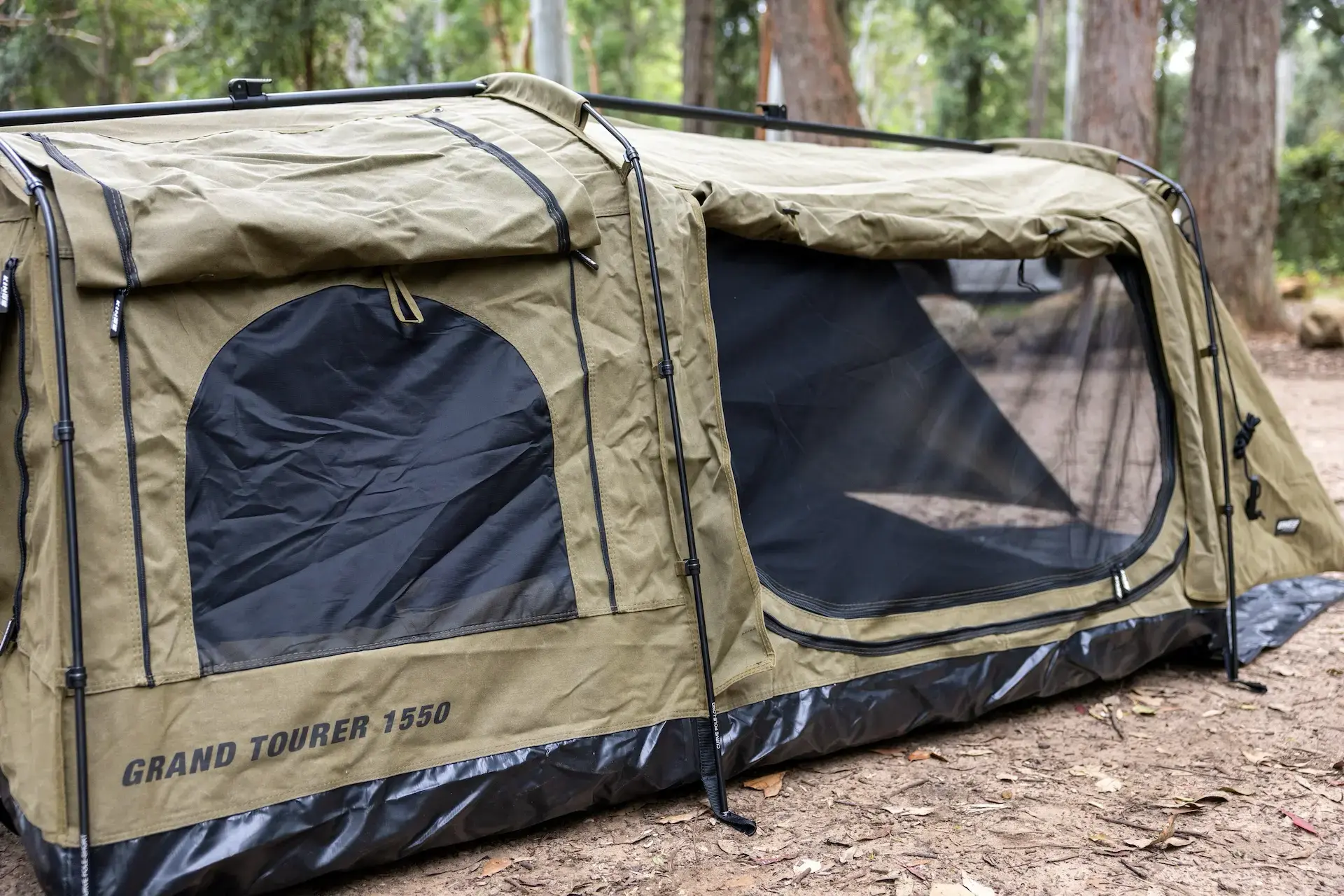 Grand Tourer Swag Storm Shutters: View of internal and external window ventilation for rain protection