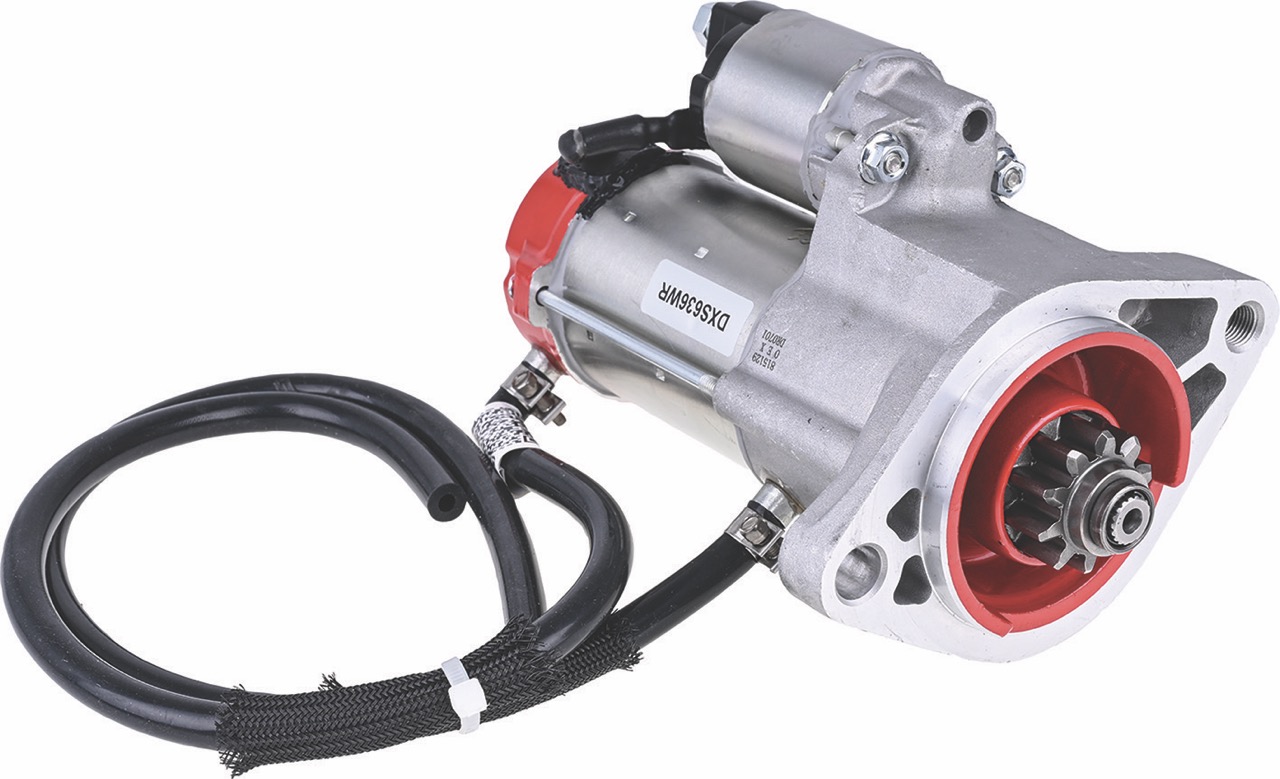 Detailed view of an OEX water-resistant starter motor showing the front seal and drain breather tube