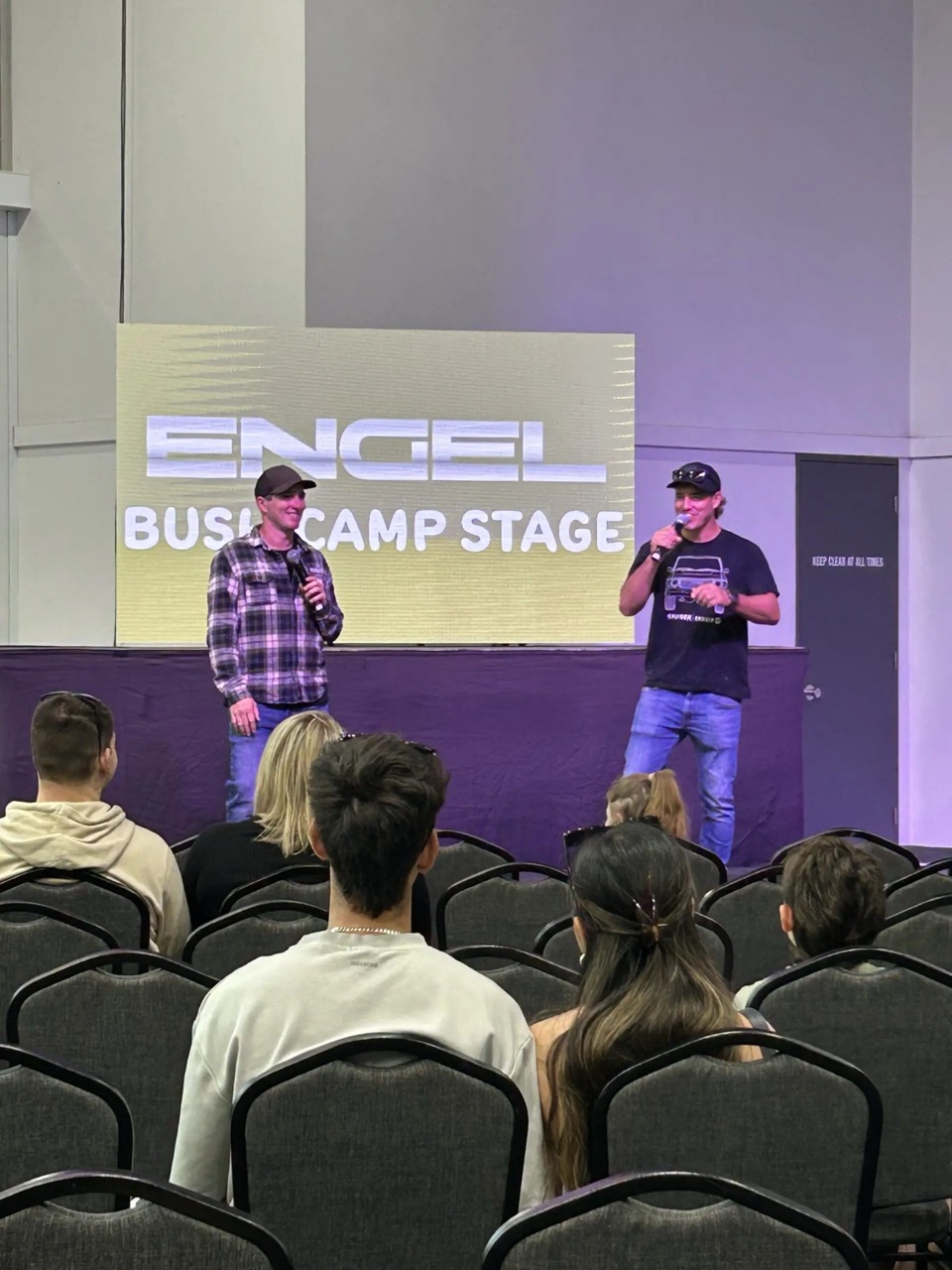 Presenters speaking to a crowd at the Engel Bush Camp Stage